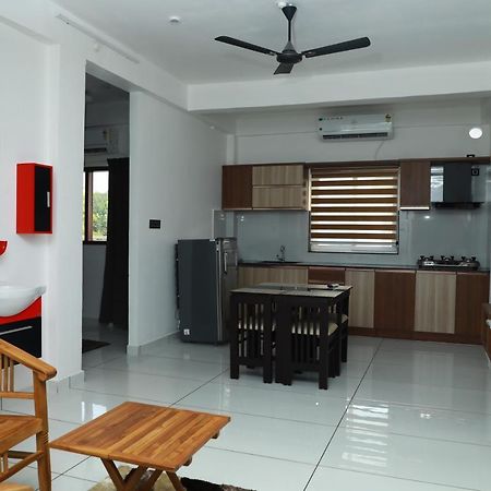 Achoos Residency Hotel Tiruvalla Exterior photo