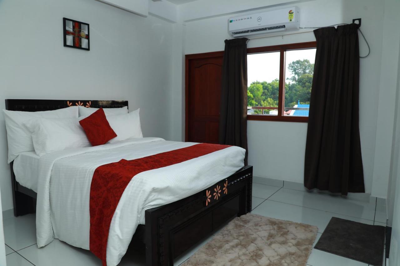 Achoos Residency Hotel Tiruvalla Exterior photo
